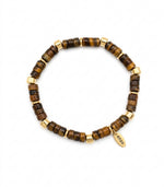 Load image into Gallery viewer, Brazalete coco y acero con baño oro