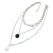 Multi pendant with volcanic lava and baroque pearl