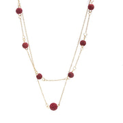 Gold-plated steel pendant with volcanic lava, fire design
