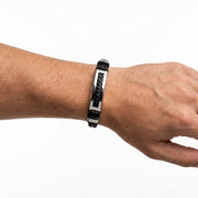 Bracciale rigido in pelle e acciaio 316