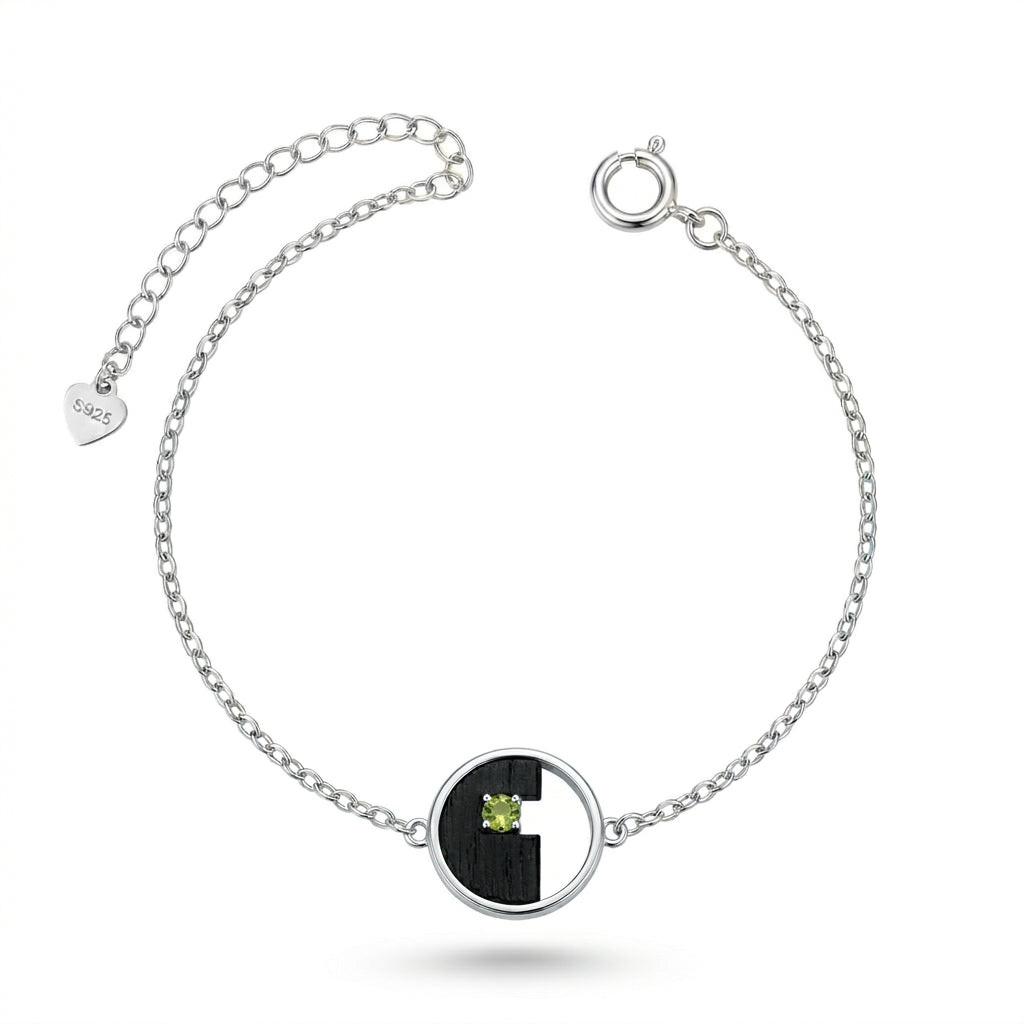 Pulsera de plata con olivina engarzada