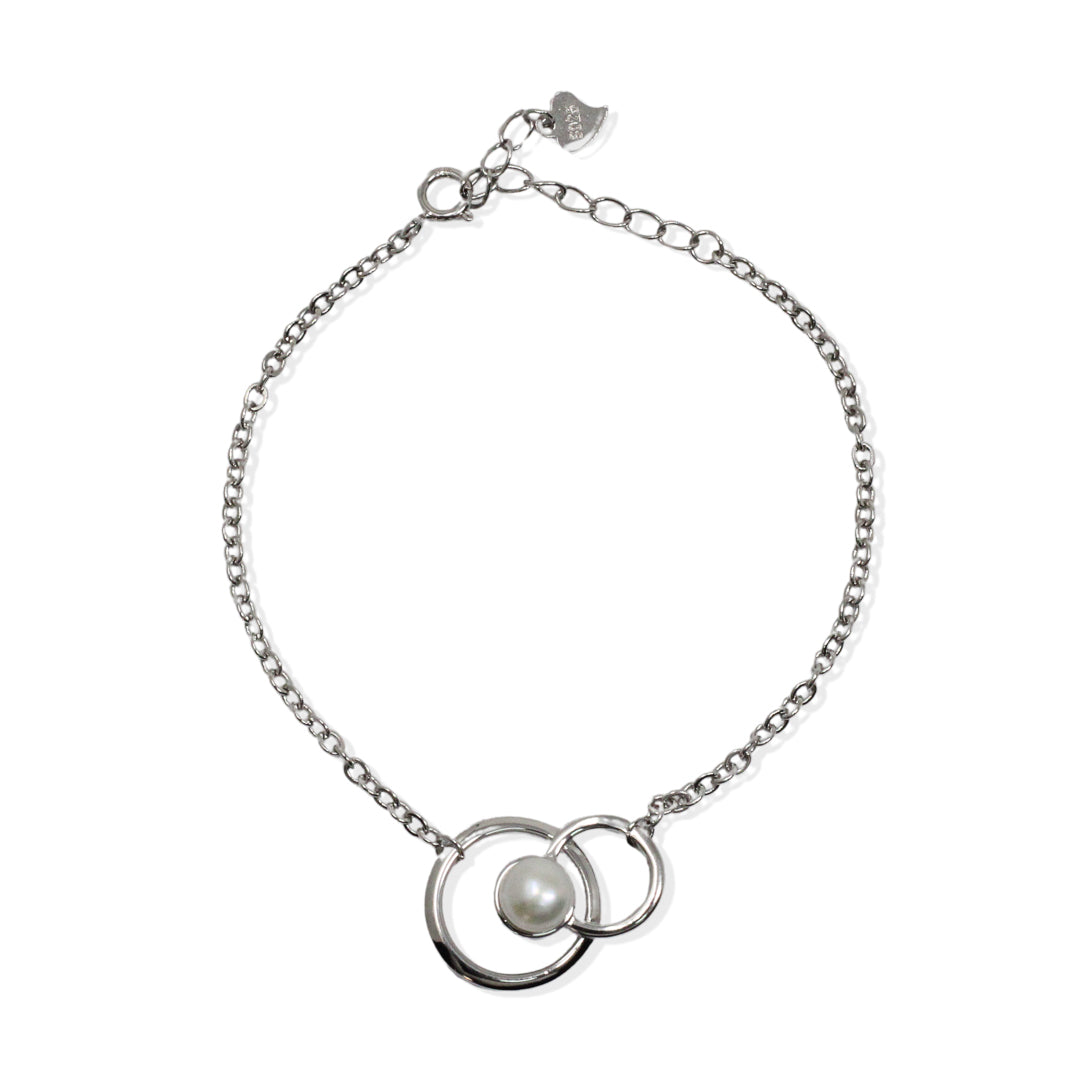 Pulsera de plata con doble círculo y perla