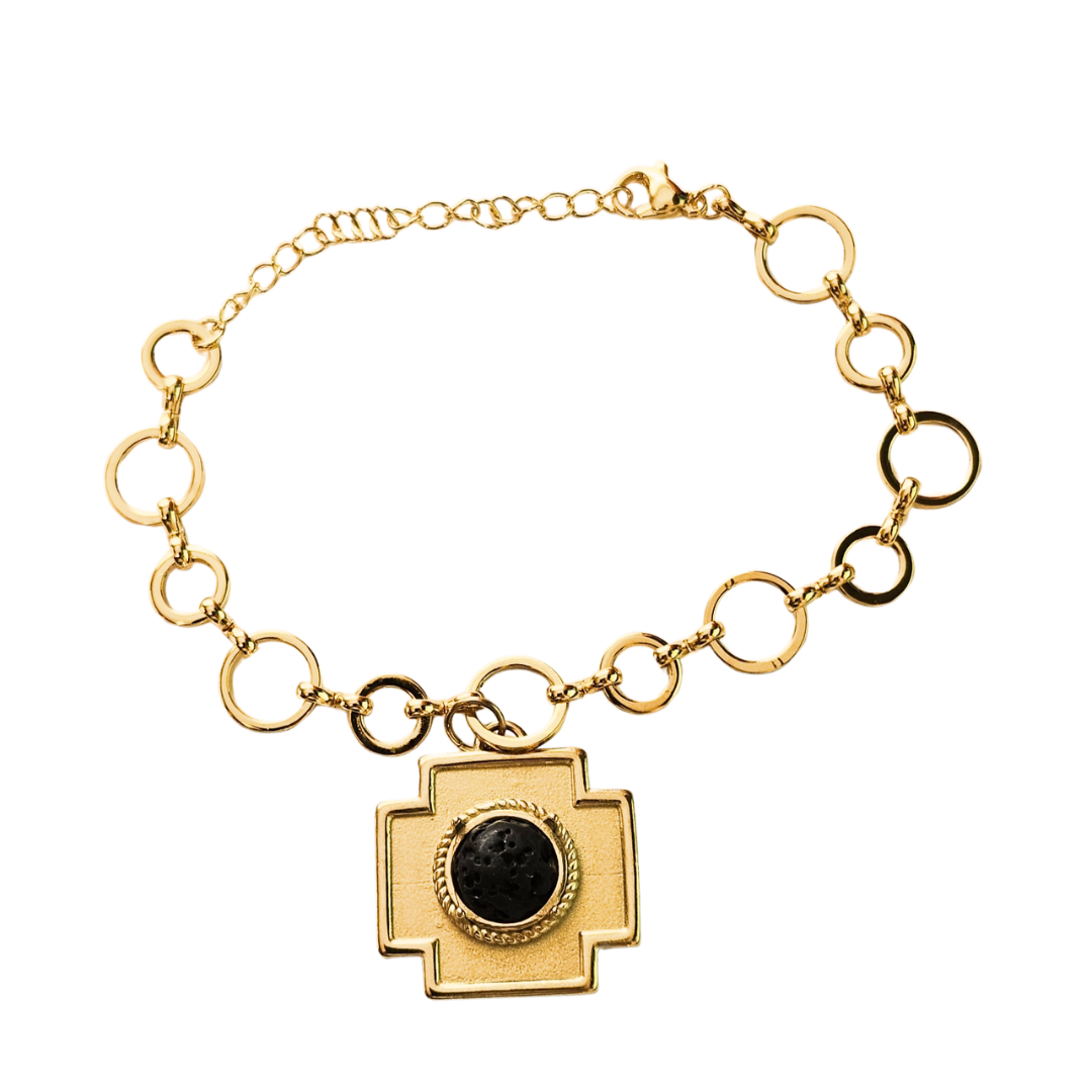 Pulsera baño de oro con lava y cruz