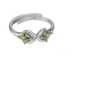 Sterling silver ring with peridot set in an X shape