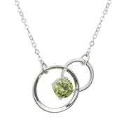 Sterling silver pendant with peridot and interlocking double circle
