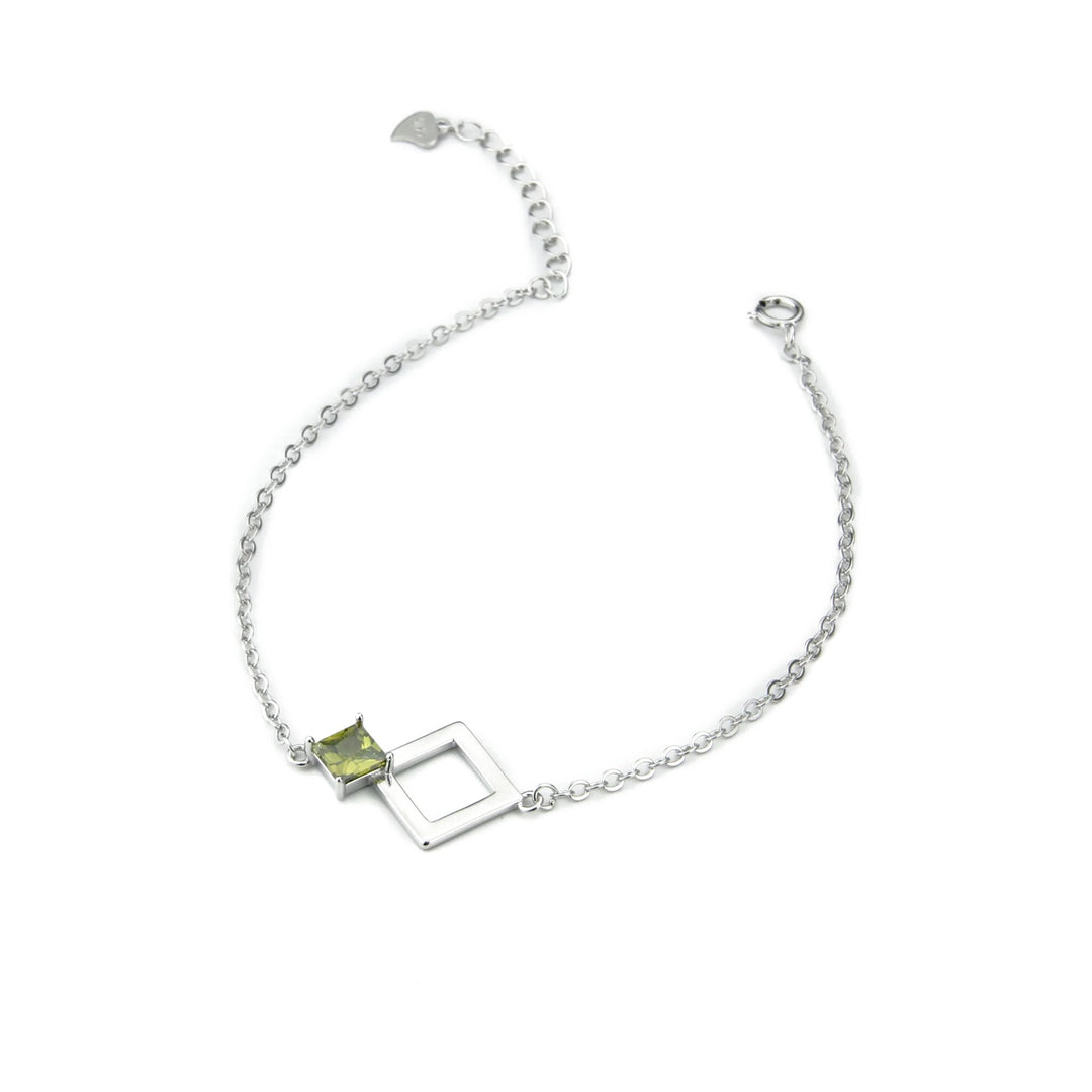 Pulsera de plata con olivina en doble rombo